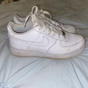Slightly worn Air Force 1s